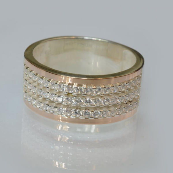 Срібна каблучка з золотими вставками