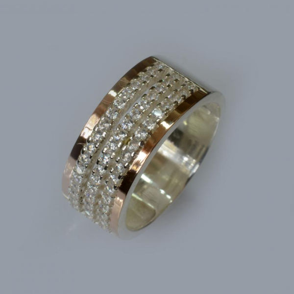 Срібна каблучка з золотими вставками