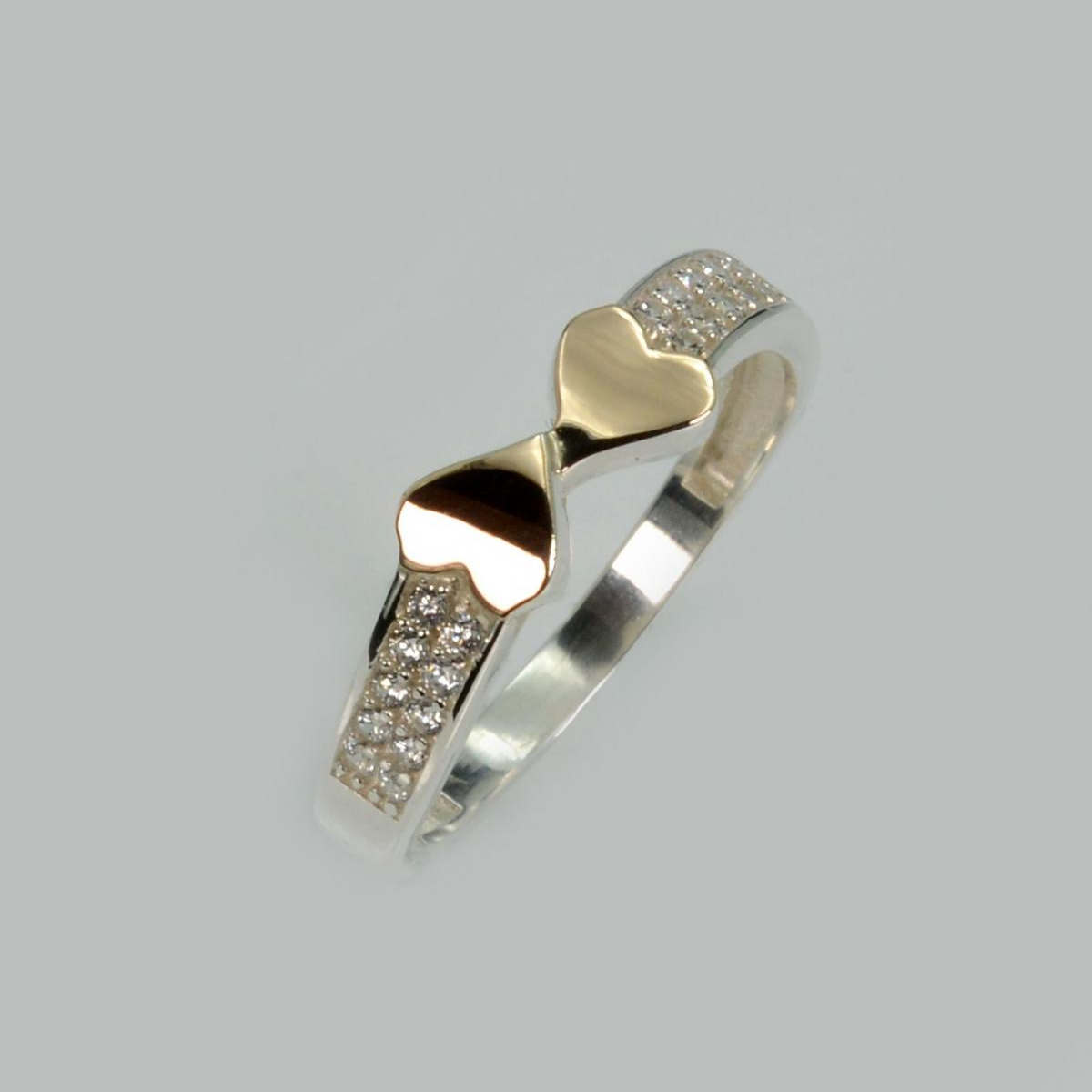 Срібна каблучка з золотими вставками