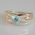 Срібна каблучка з золотими вставками