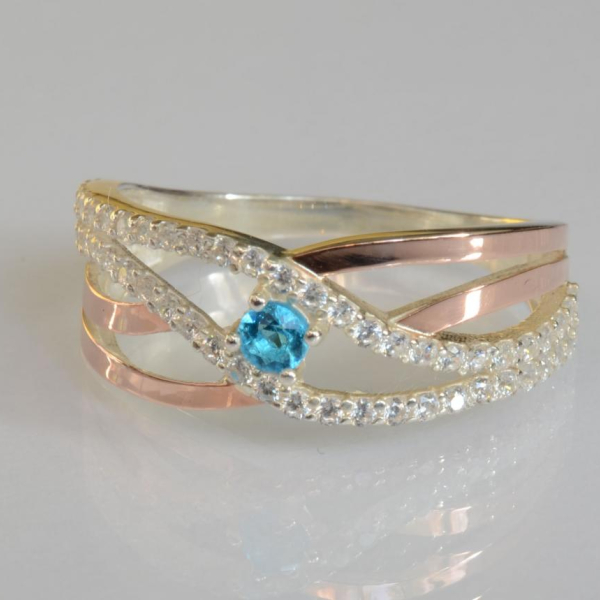 Срібна каблучка з золотими вставками