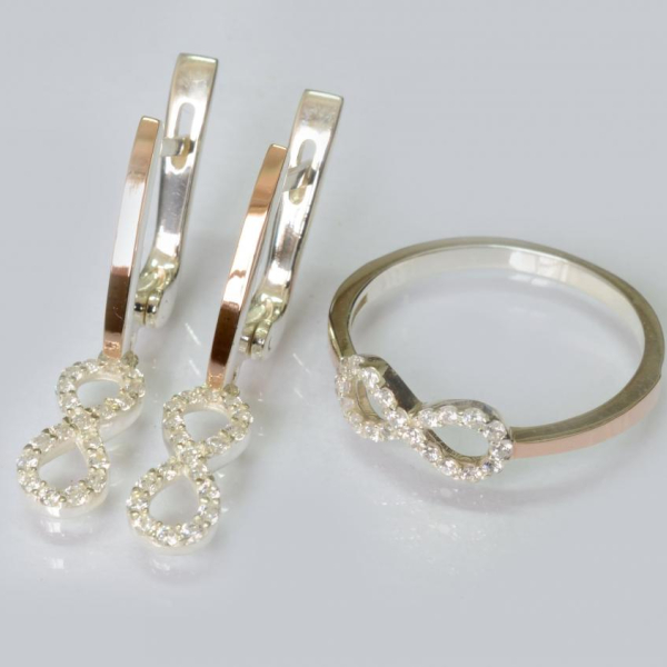 Срібний набір з золотими пластинами