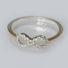 Срібна каблучка з золотими вставками