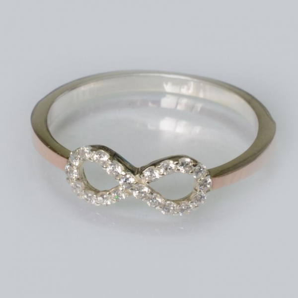 Срібна каблучка з золотими вставками