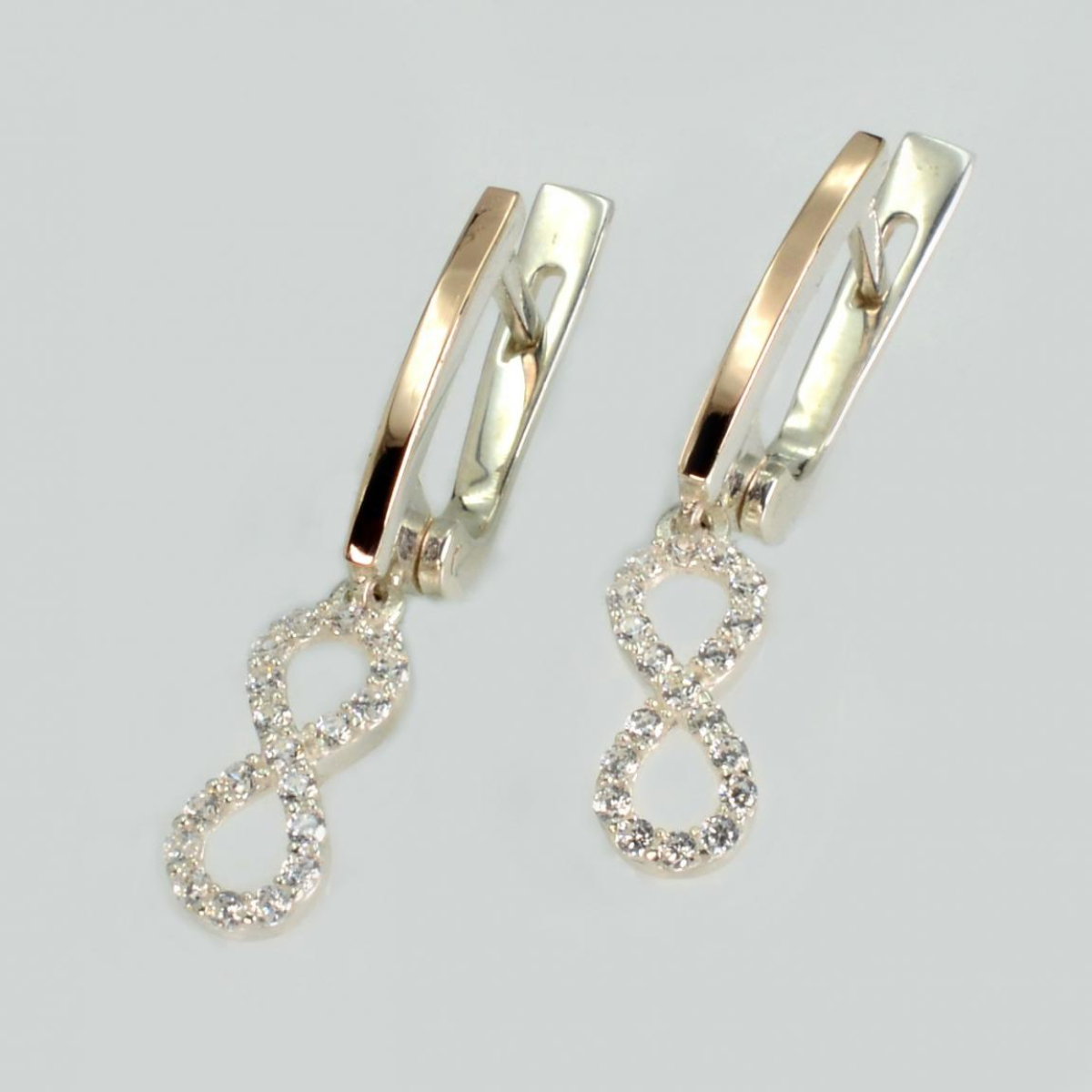 Срібні сережки з золотими пластинами