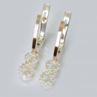 Срібні сережки з золотими пластинами