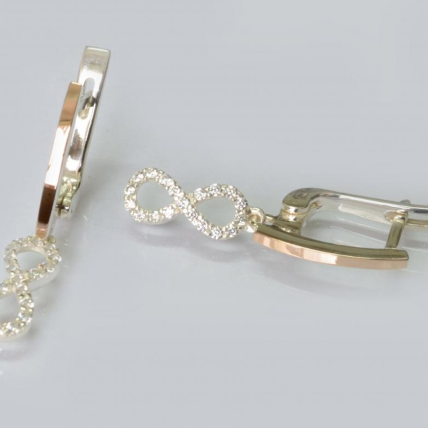 Срібні сережки з золотими пластинами