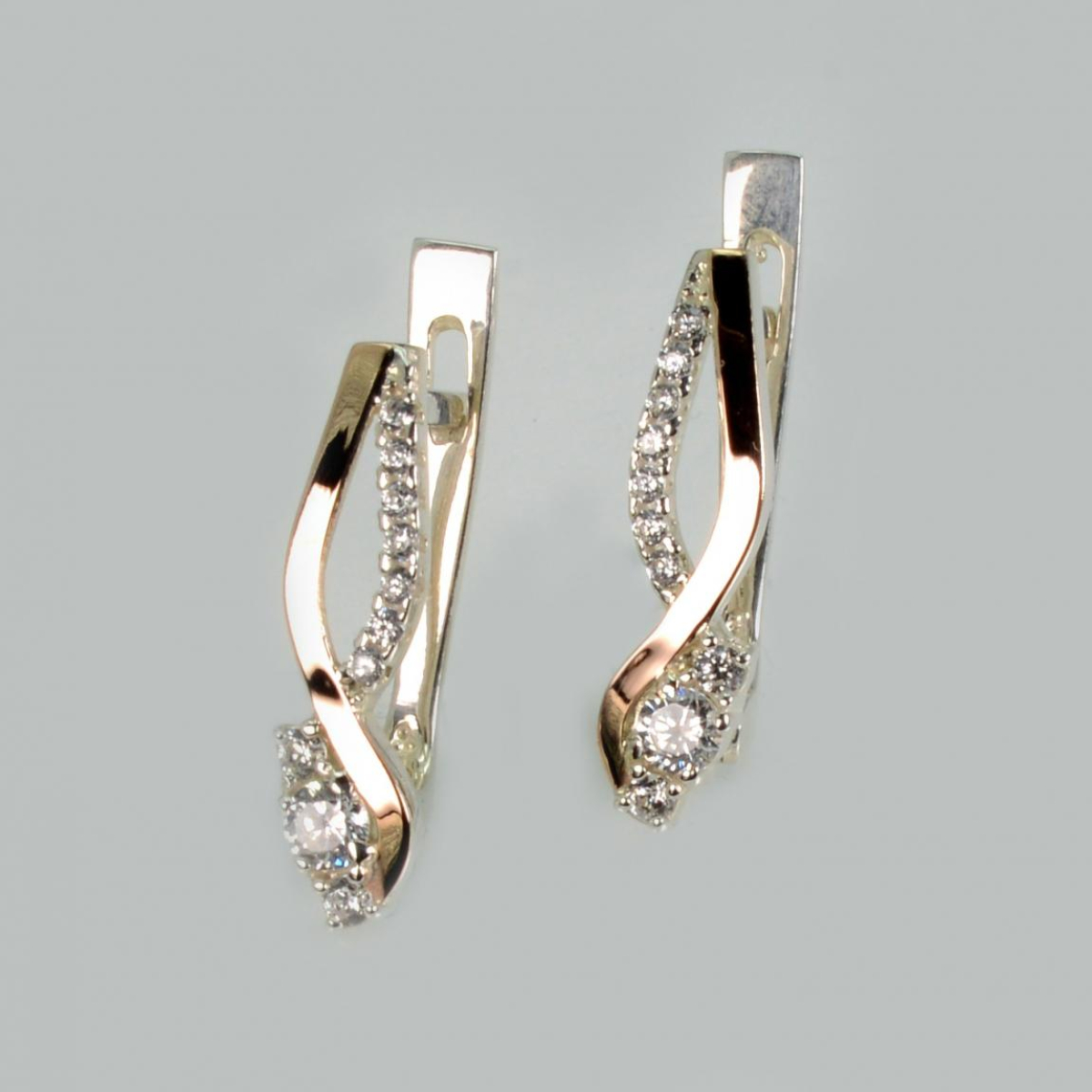 Срібні сережки з золотими пластинами