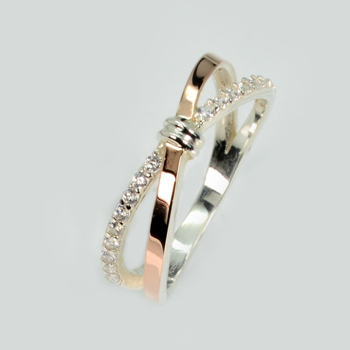 Срібна каблучка з золотими вставками