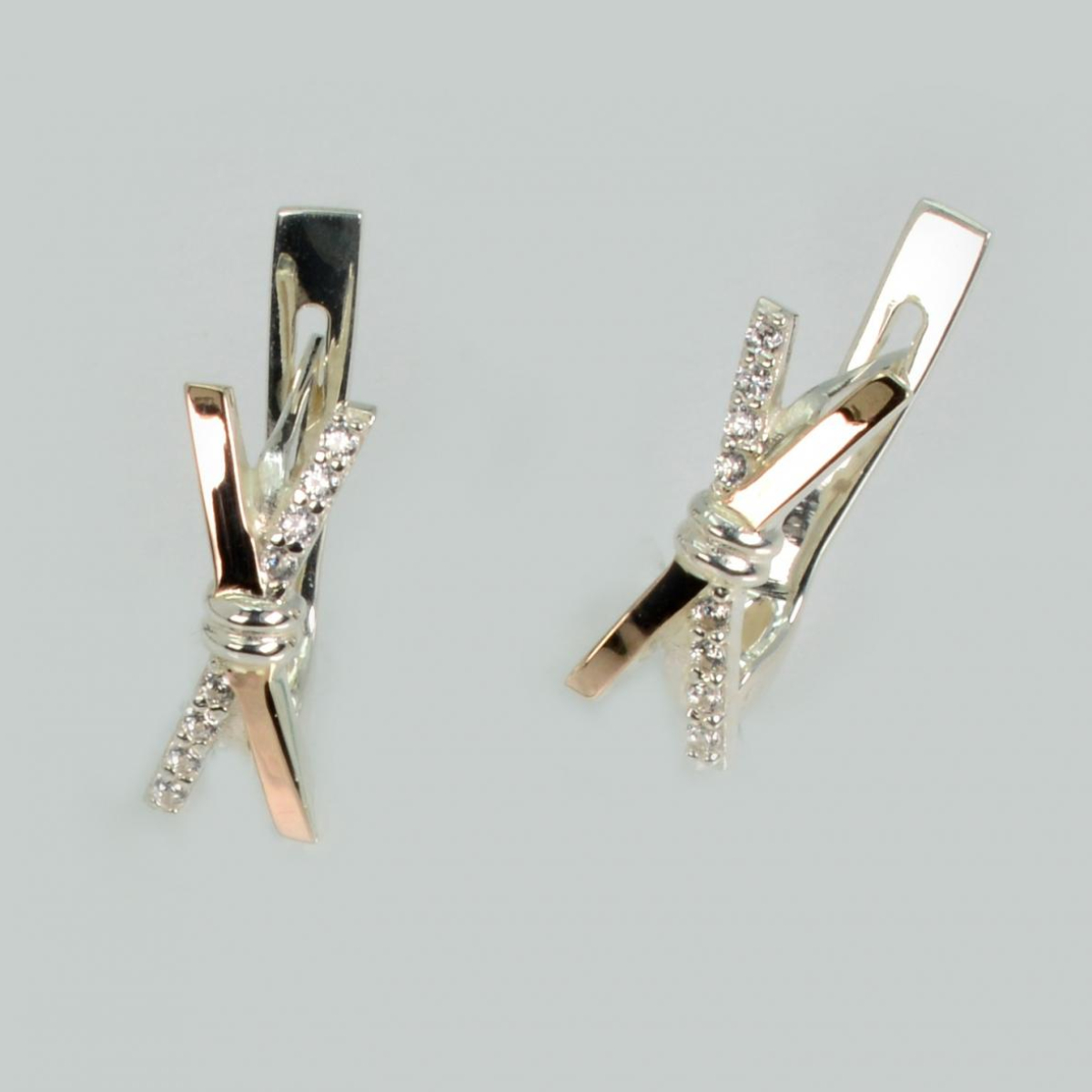 Срібні сережки з золотими пластинами