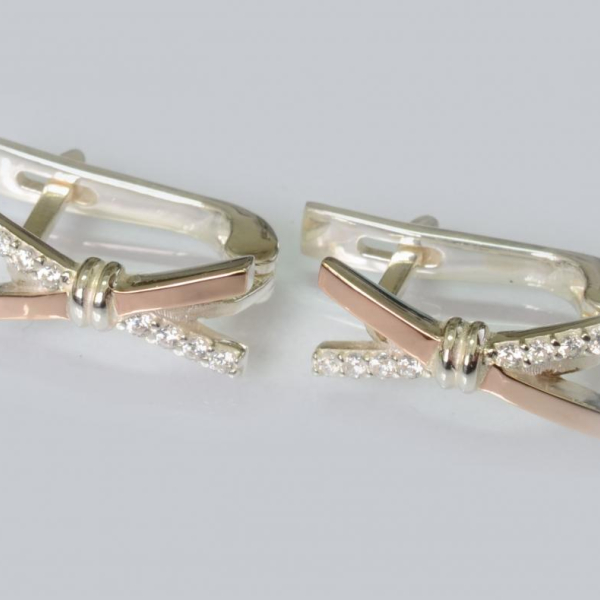 Срібні сережки з золотими пластинами