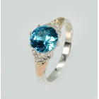 Срібна каблучка з золотими вставками