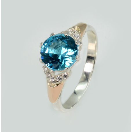 Серебряное кольцо с золотыми вставками