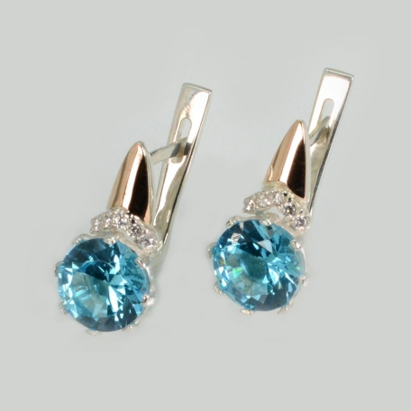 Срібні сережки з золотими пластинами