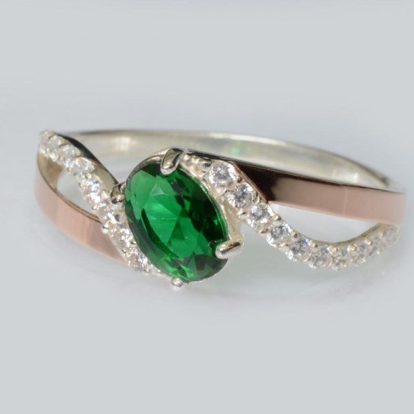 Срібна каблучка з золотими вставками