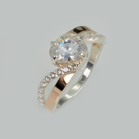 Срібна каблучка з золотими вставками