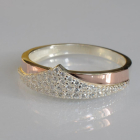 Срібна каблучка з золотими вставками