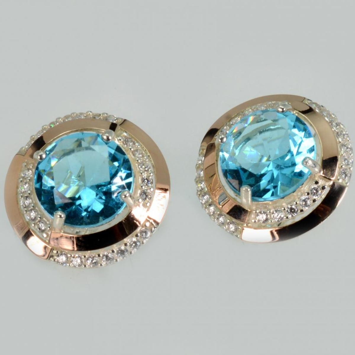 Срібні сережки з золотими пластинами