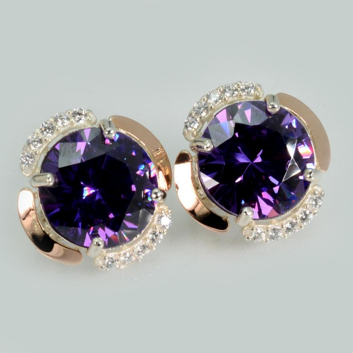 Срібні сережки з золотими пластинами