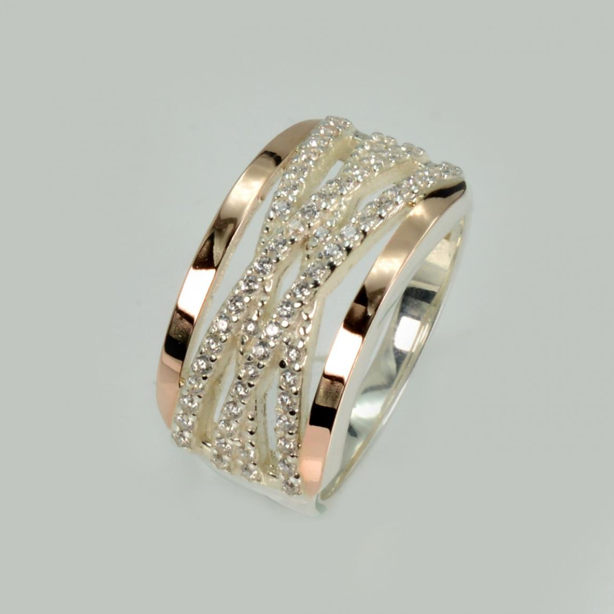 Срібна каблучка з золотими вставками