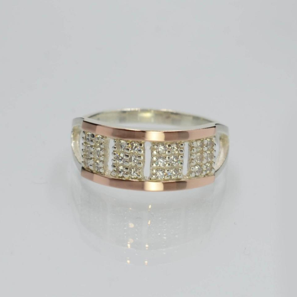 Срібна каблучка з золотими вставками