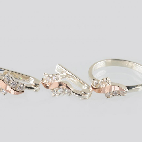 Срібний набір з золотими пластинами