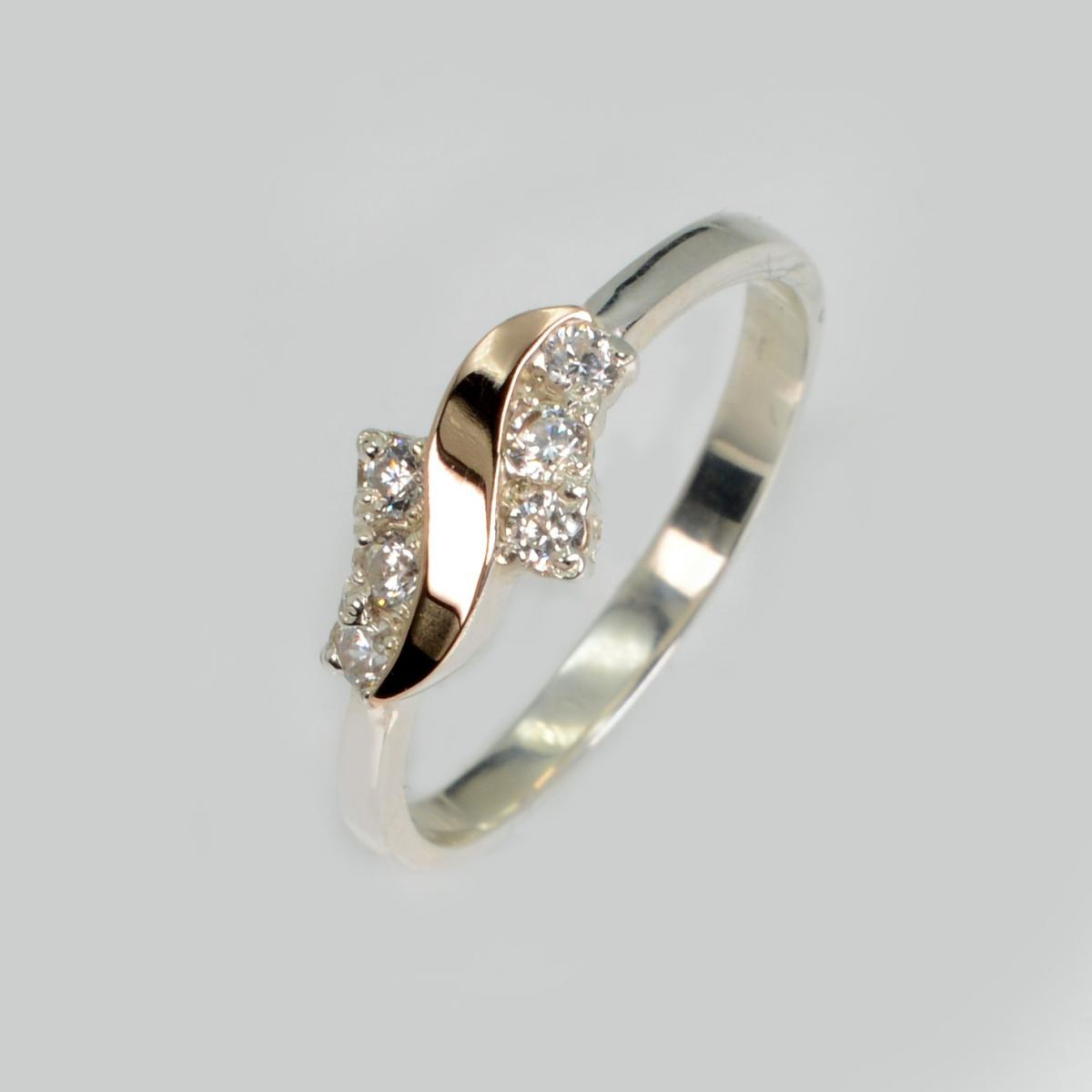 Срібна каблучка з золотими вставками