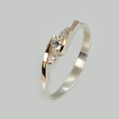 Срібна каблучка з золотими вставками