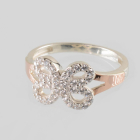 Срібна каблучка з золотими вставками