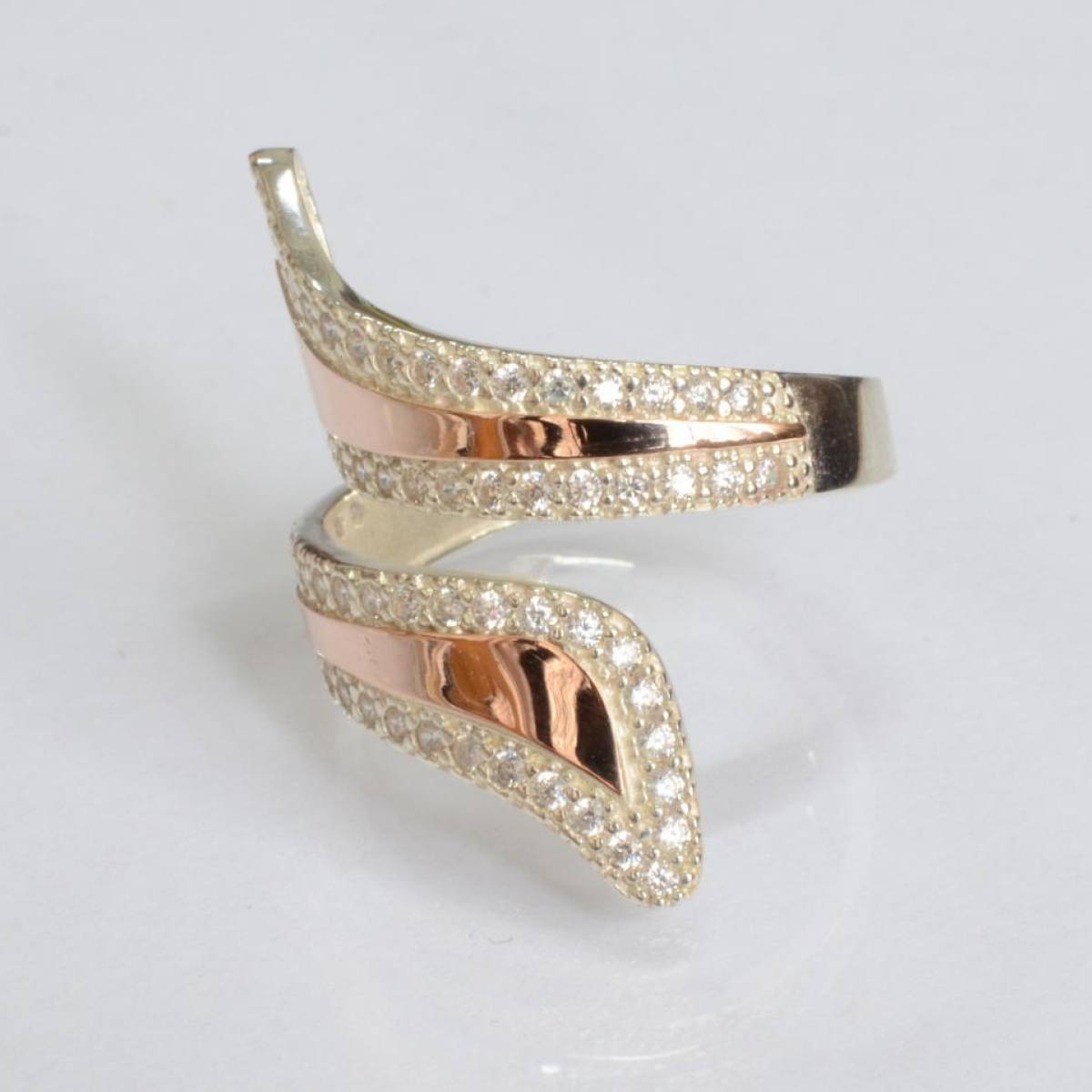 Срібна каблучка з золотими вставками