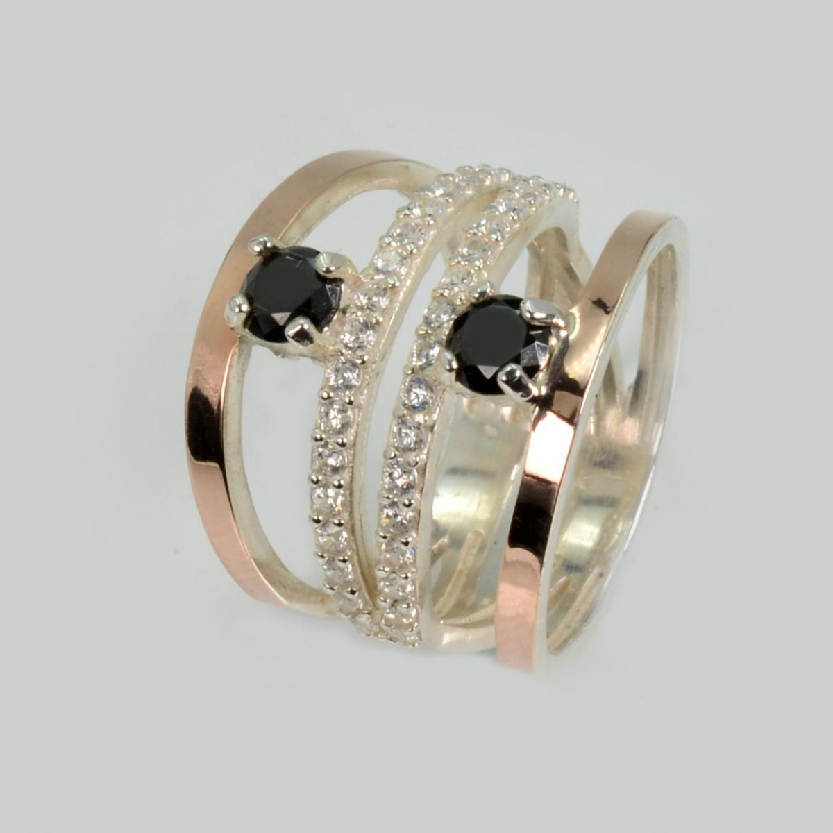 Срібна каблучка з золотими вставками