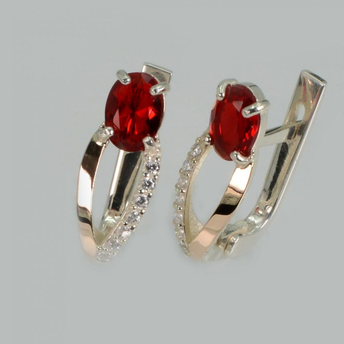 Срібні сережки з золотими пластинами