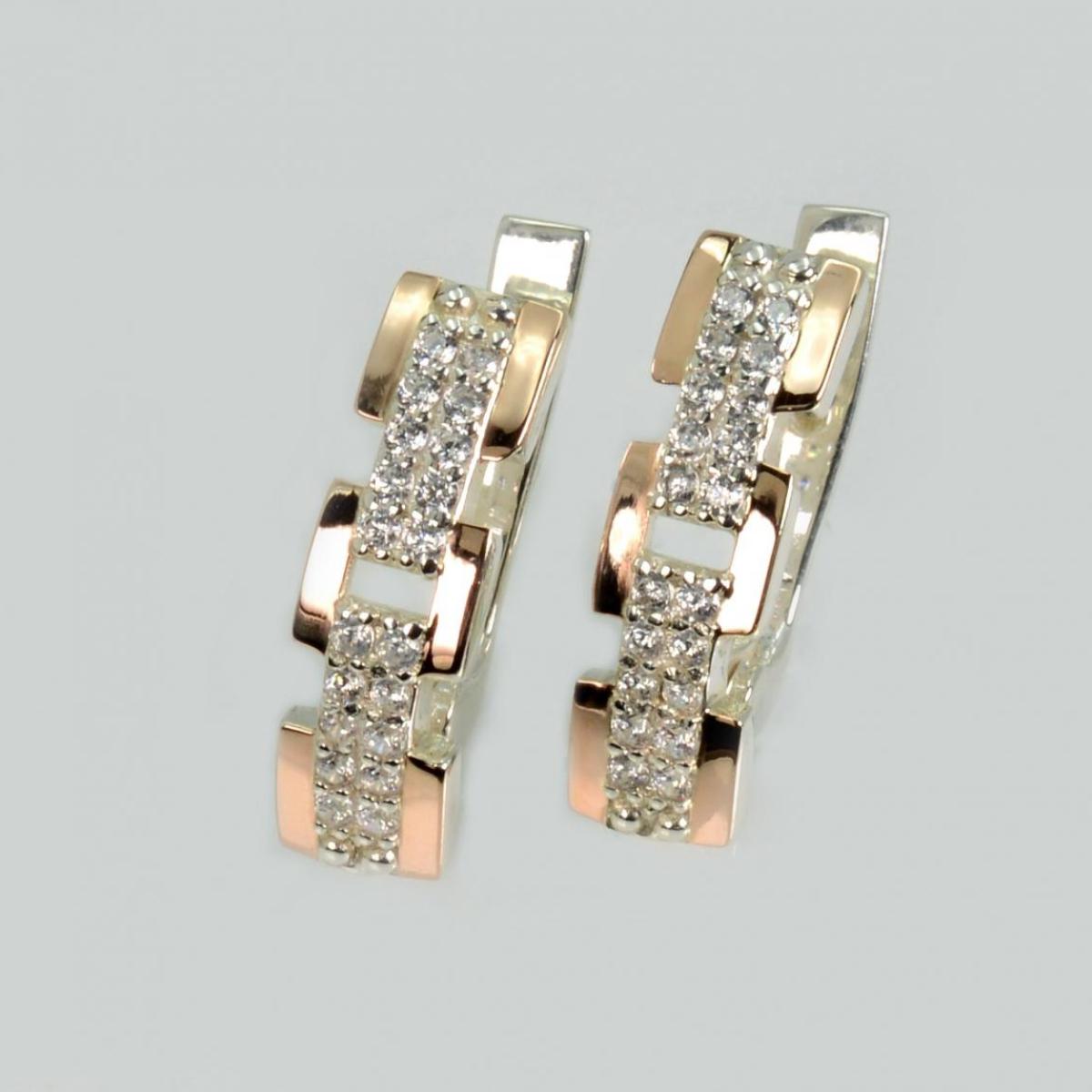 Срібні сережки з золотими пластинами