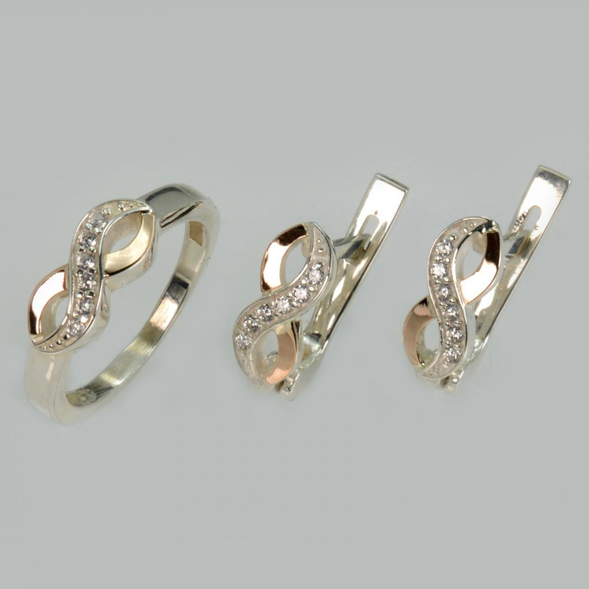 Срібний набір з золотими пластинами