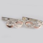 Срібні сережки з золотими пластинами