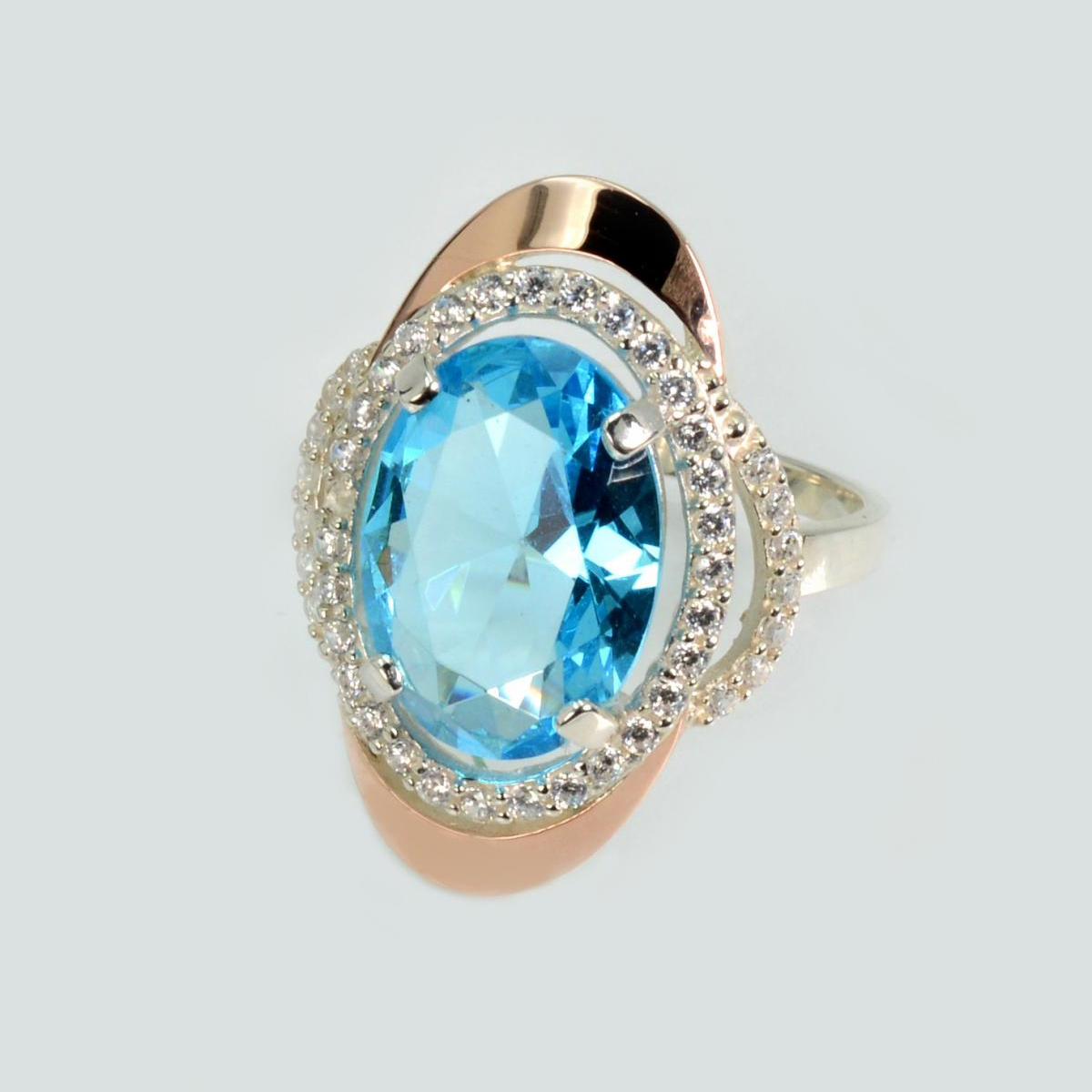 Срібна каблучка з золотими вставками