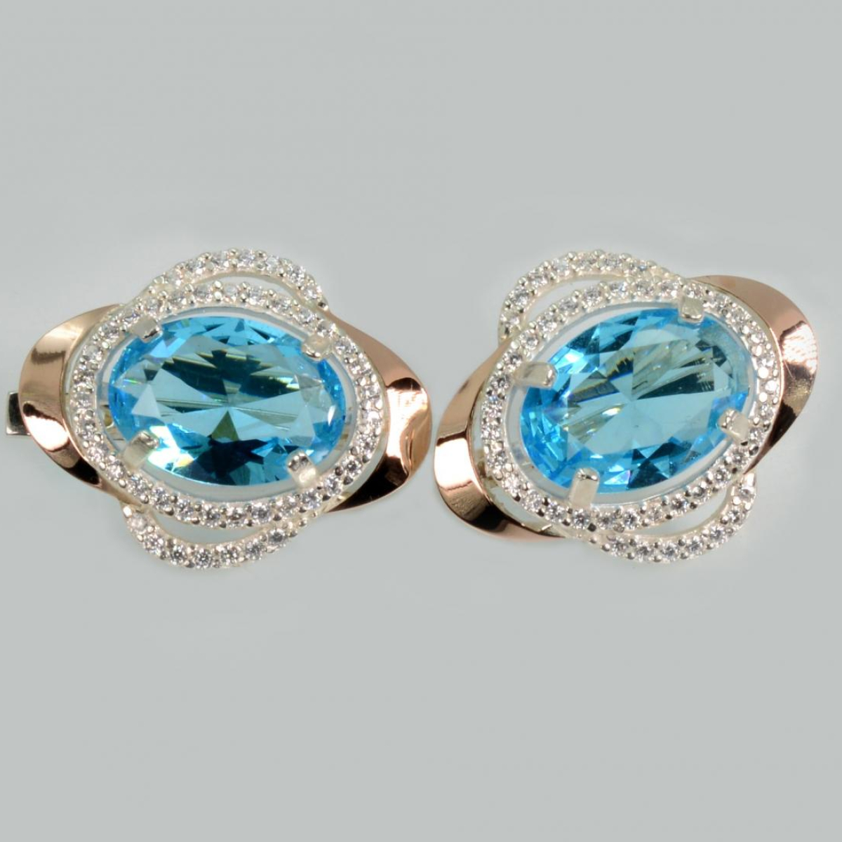 Срібні сережки з золотими пластинами