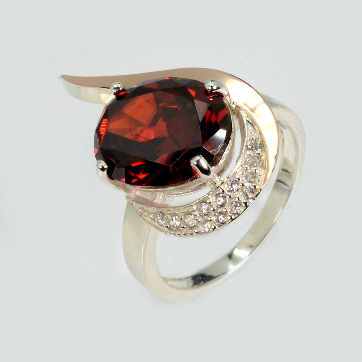 Срібна каблучка з золотими вставками