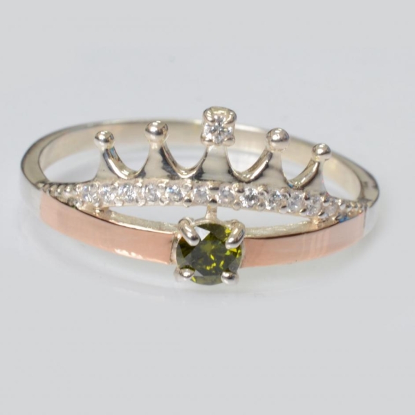 Срібна каблучка з золотими вставками