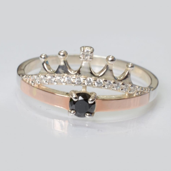 Срібна каблучка з золотими вставками