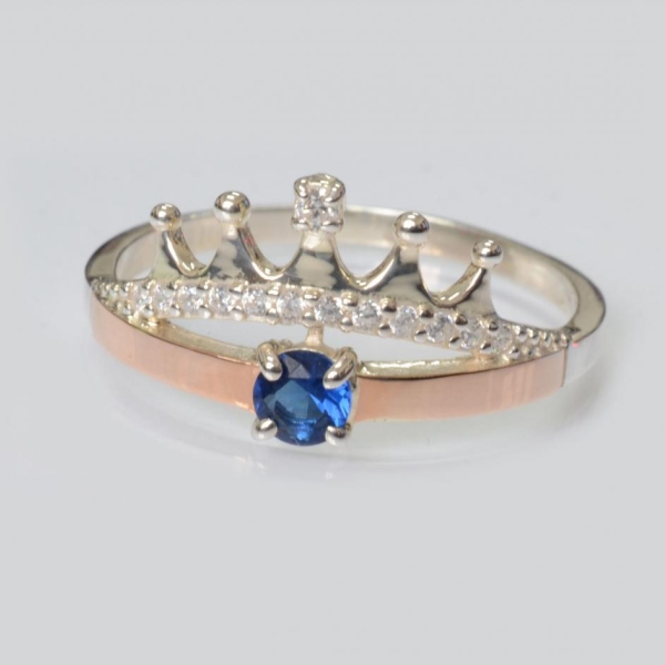 Срібна каблучка з золотими вставками