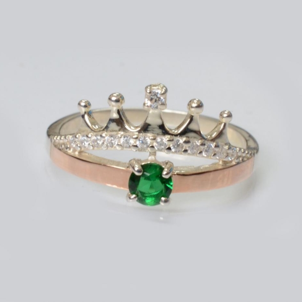 Срібна каблучка з золотими вставками