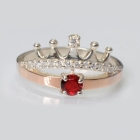 Срібна каблучка з золотими вставками