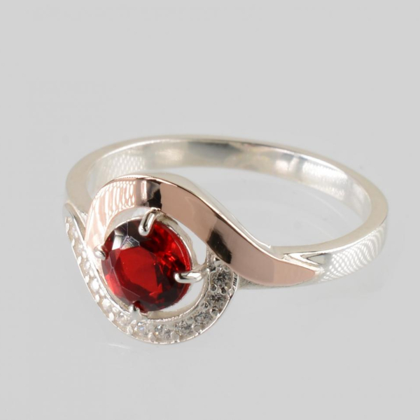 Срібна каблучка з золотими вставками