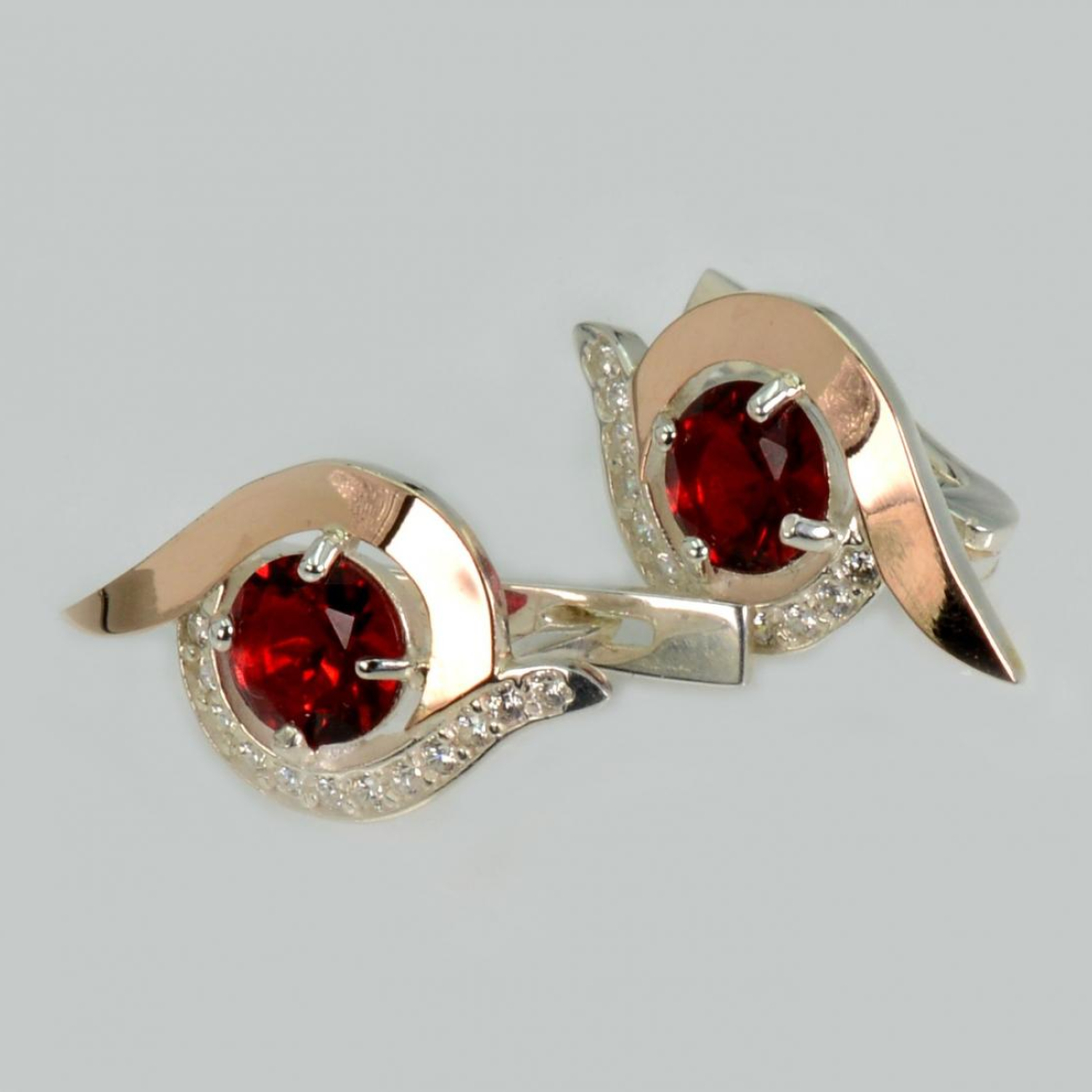 Срібні сережки з золотими пластинами