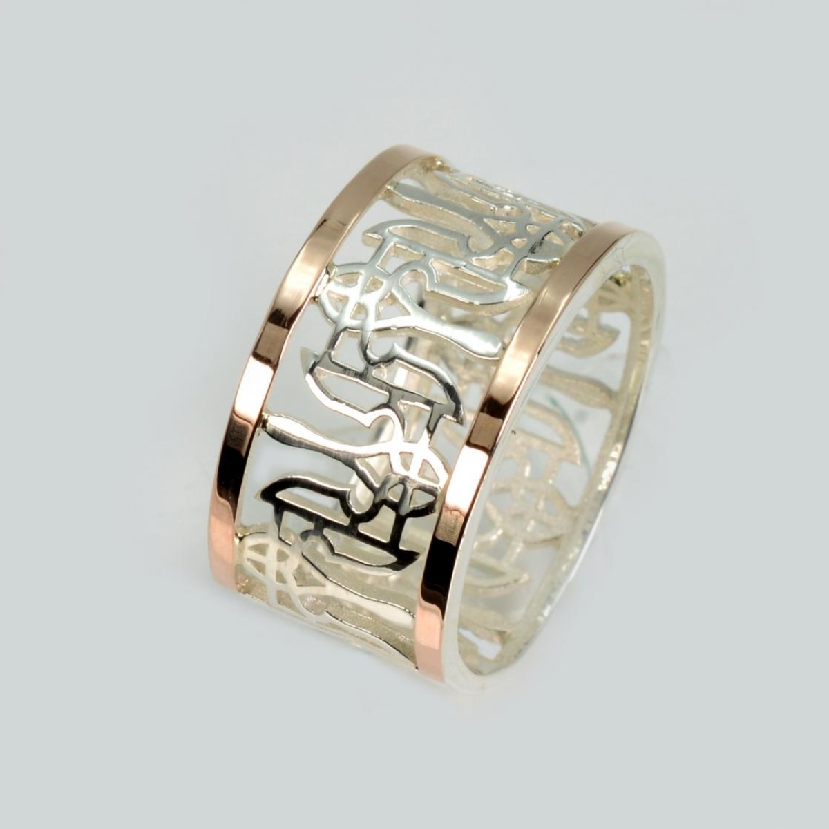 Срібне чоловіче кільце з золотими пластинами та гербами України