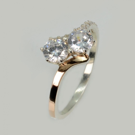 Срібна каблучка з золотими вставками