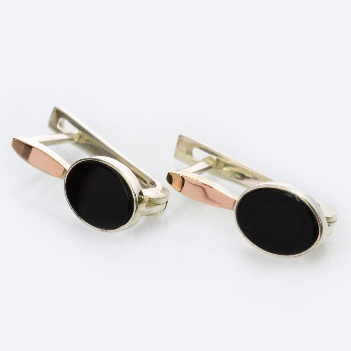 Срібні сережки з золотими пластинами