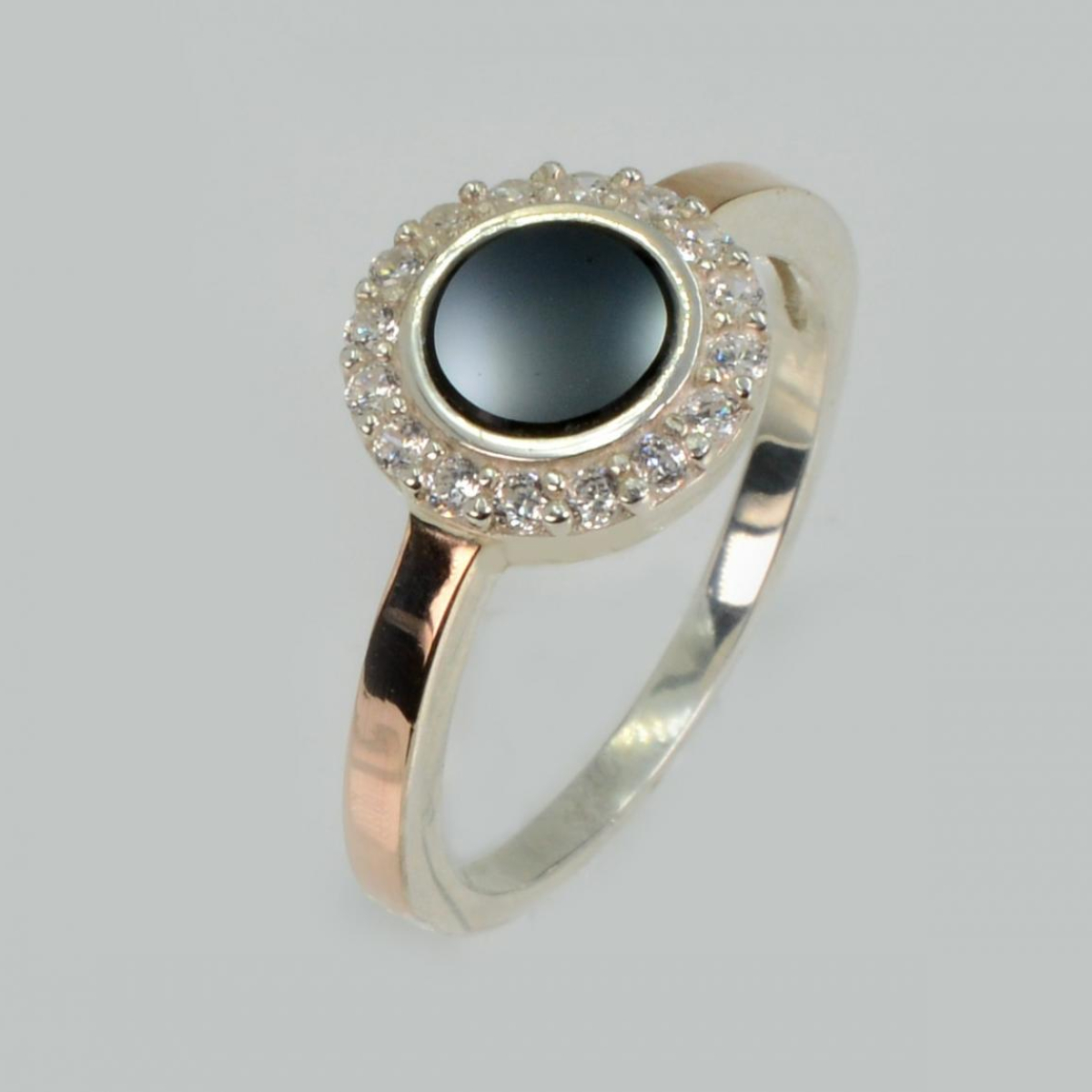 Срібна каблучка з золотими пластинами та оніксом