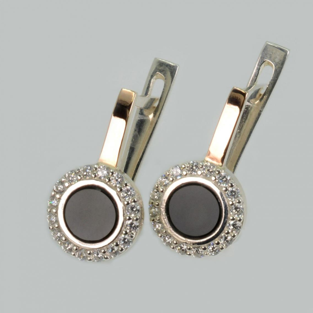 Срібні сережки з оніксом